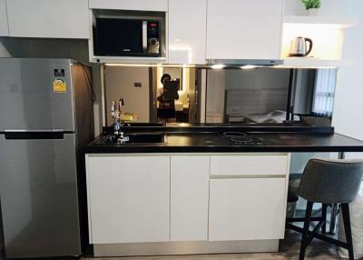 Modern kitchen with stainless steel appliances and ample counter space