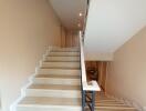 Spacious well-lit staircase with modern design