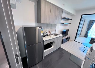 Modern kitchen with stainless steel appliances and clean design