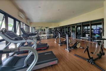 Spacious modern gym with various exercise equipment