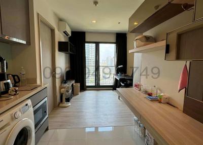 Modern kitchen with appliances and ample counter space in an apartment