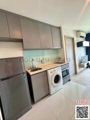 Modern kitchen with integrated appliances and ample cabinet space