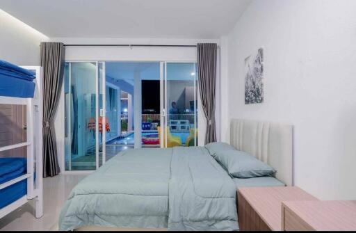 Modern Bedroom with Direct Access to Pool
