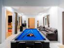Spacious Recreation Room with Pool Table and Comfortable Seating