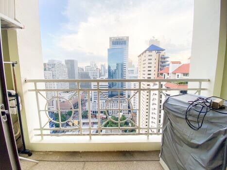 High-rise city view from apartment balcony