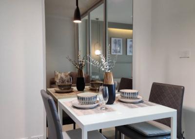 Modern dining area with stylish furniture and decor