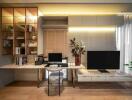 Modern home office with desk, shelves and television unit