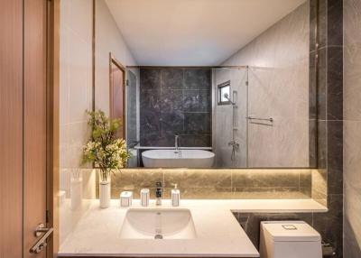 Contemporary bathroom with wooden cabinets and clean design