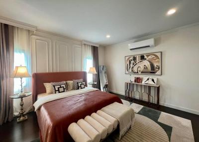 Elegant bedroom with modern furnishings and tasteful decor