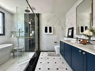 Modern bathroom with marble tiles and elegant fixtures