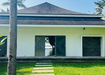 Balinese style beach front villa for sale in Bang Kao