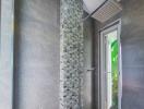 Modern bathroom with a walk-in shower featuring decorative mosaic tiles
