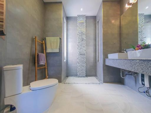Modern bathroom with walk-in shower and stylish finishes