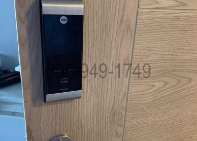 Modern electronic lock system on wooden door