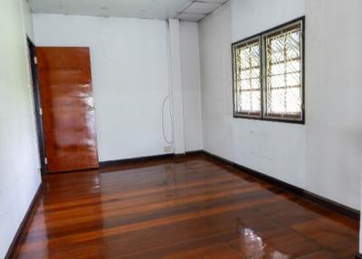 Empty room with hardwood floors and daylight