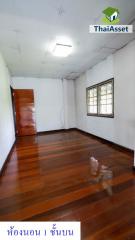 Empty room with hardwood floors and daylight