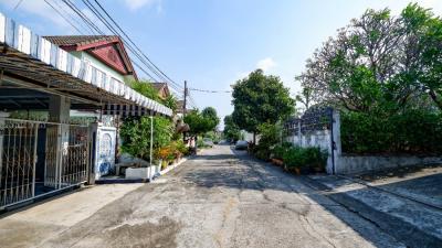 Residential street view with surrounding homes and paved road