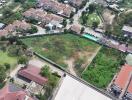 Aerial view of a vacant lot in a residential area