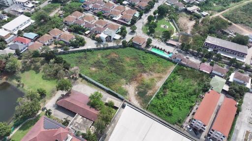 Aerial view of a vacant lot in a residential area