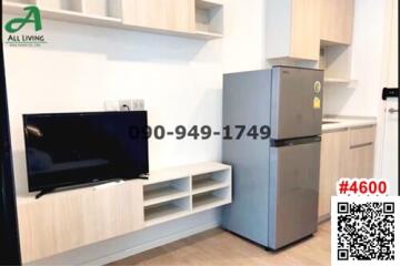 Modern kitchen setup with integrated appliances and shelving units
