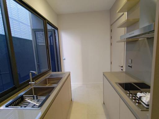 Modern kitchen with stainless steel appliances and ample cabinet space