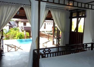 Bedroom with direct access to pool and terrace