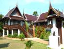 Traditional style house with a lush garden setting