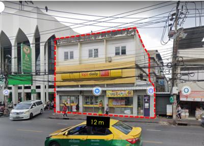 Street view of a commercial property with storefront