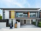 Modern Two-Storey Residential Home with Balcony and Carport