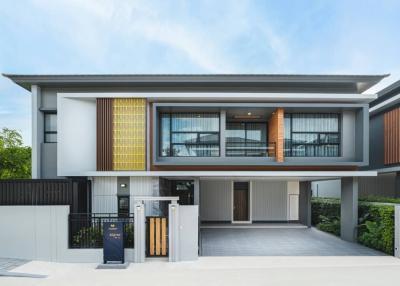 Modern Two-Storey Residential Home with Balcony and Carport