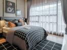 Elegantly furnished bedroom with large bed and stylish decor