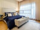 Elegant bedroom with natural light and modern design