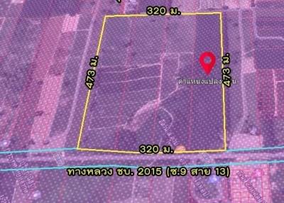 Aerial view of a land plot with measurement labels for real estate listing