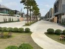 Lush green pathway in residential complex