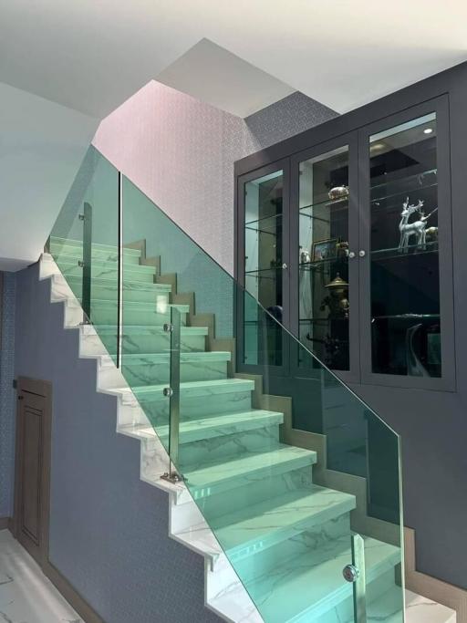 Modern glass balustrade staircase in a contemporary home