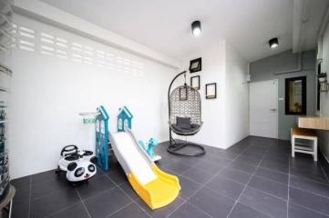 Modern spacious building interior with children