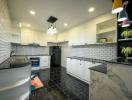 Modern kitchen with white cabinetry and subway tile backsplash