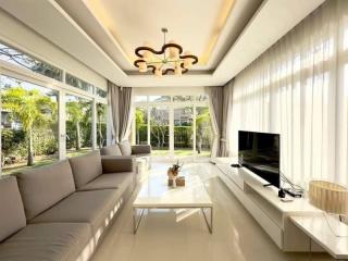 Bright and spacious living room with modern furniture and large windows