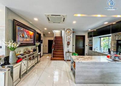 Modern kitchen with central island and open floor plan