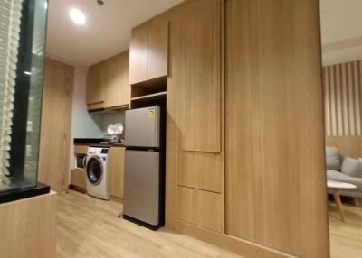 Modern kitchen integrated with laundry appliances