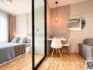 Modern compact bedroom with workspace and en suite bathroom