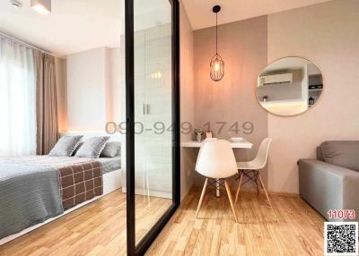 Modern compact bedroom with workspace and en suite bathroom