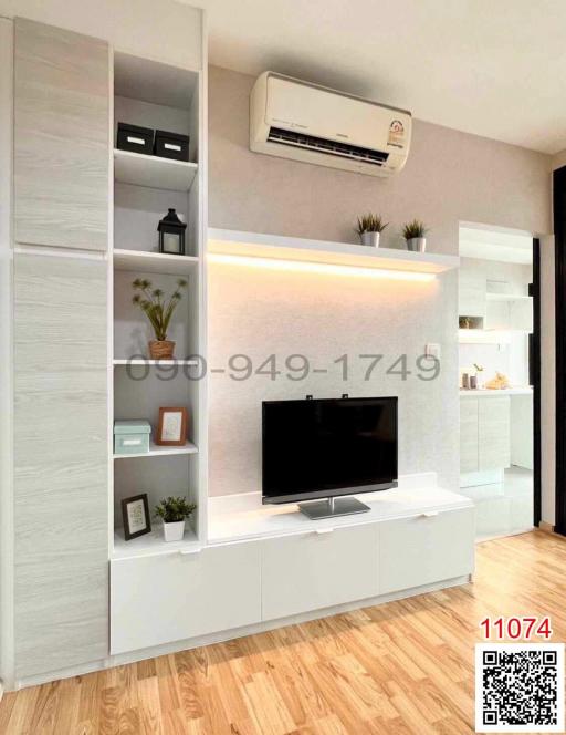 Modern living room interior with television and air conditioning unit