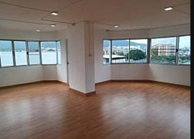 Spacious and Bright Empty Living Room with Large Windows