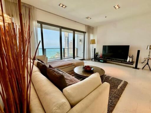 Spacious living room with ocean view and natural light