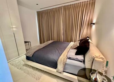 Contemporary bedroom with king-size bed and elegant bedding