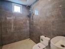 Modern bathroom with tiled walls and elegant fixtures