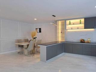 Modern kitchen with integrated dining area