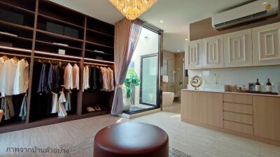 Spacious bedroom with walk-in closet and modern décor