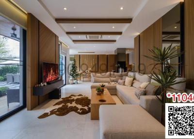 Contemporary living room with large windows and cozy fireplace